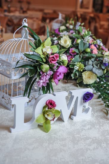 Wedding decor, LOVE letters and flowers on table